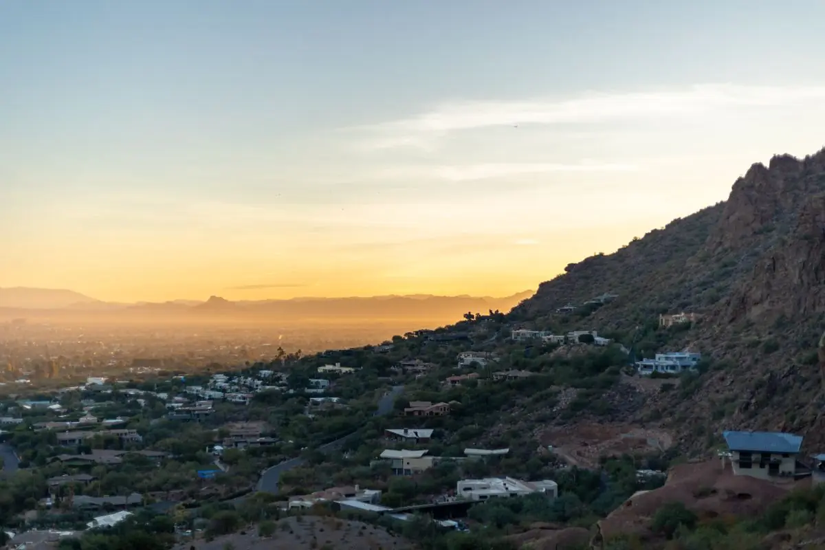Phoenix cityscape and desert hills at sunset